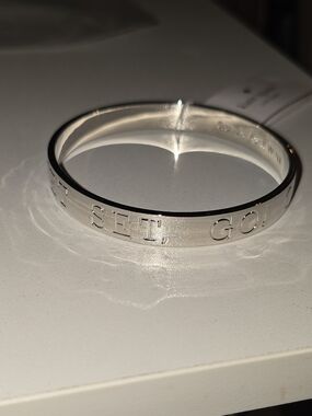 NWT Kate Spade "Quick as a Wink" Silver Tone Idiom Bangle Bracelet "On Your Mark
